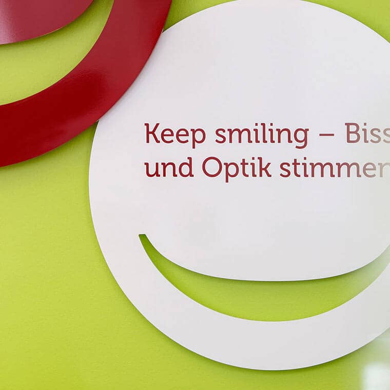 Wall with labelled smileys